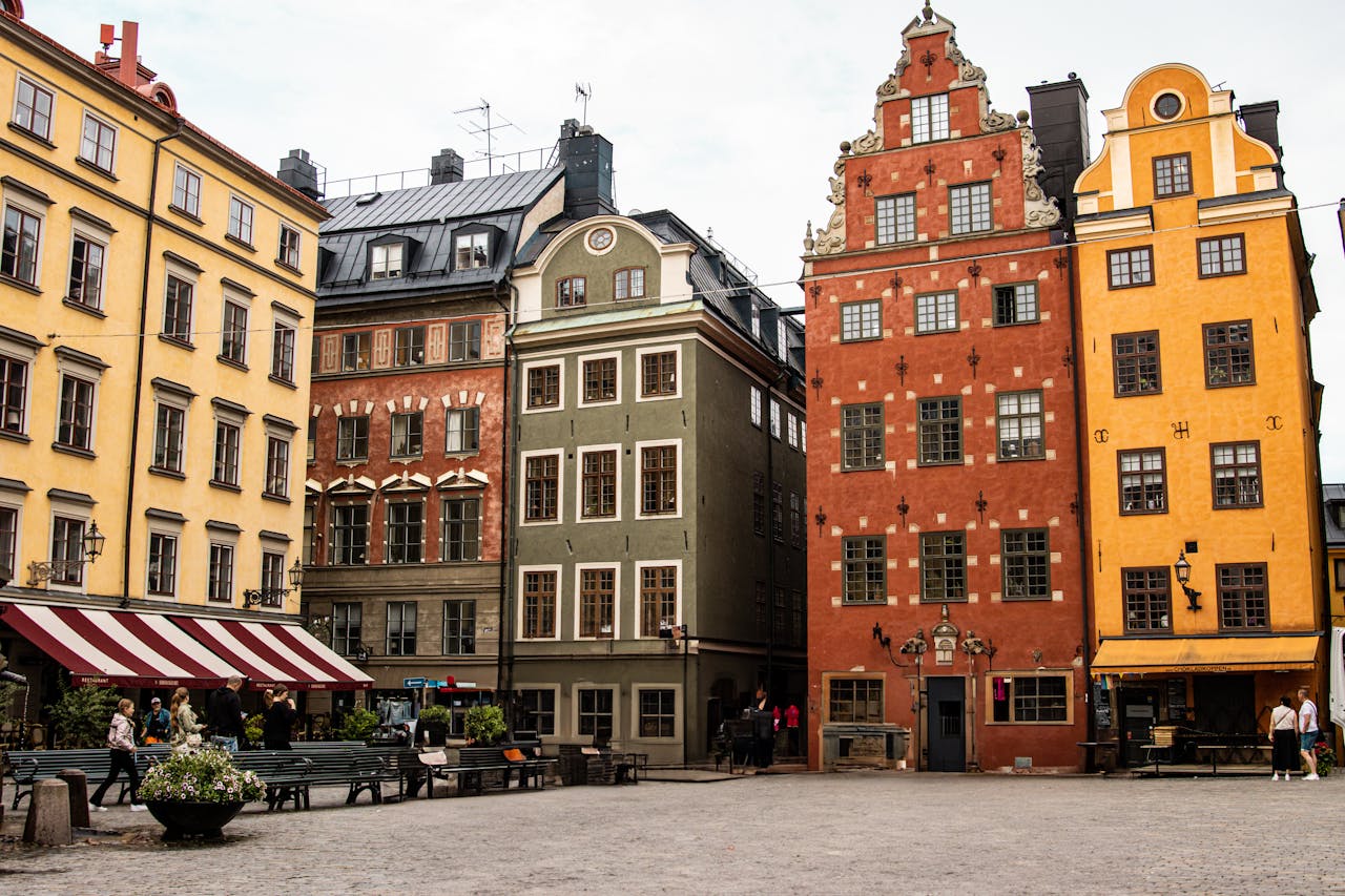about-01 Beautifully preserved historical buildings in Stockholms Gamla Stan, showcasing iconic Nordic architecture.